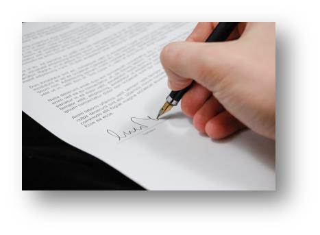 This isn't me signing the paperwork but you get the idea