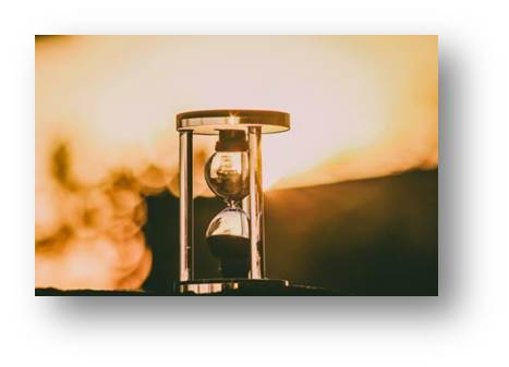 Image of an hourglass representing the time it is taking to complete on Temperance Hall