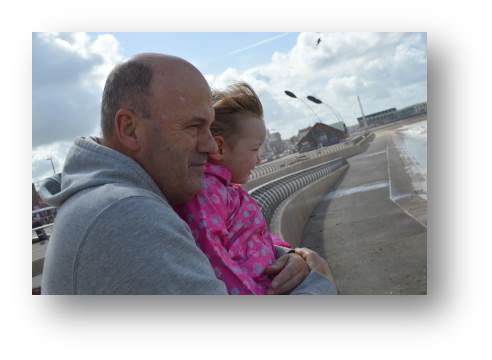 Emily with her Grandad Gary during a windy day on Blackpool Promenade