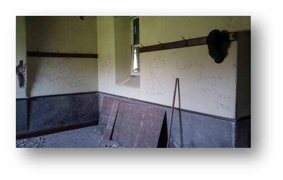 I don't scare that easily but although I'm really annoyed I can't find it in me to feel frightened of any intruder called Archie. Whoever they are they and three friends have helpfully daubed their names addresses and time of visit on the walls in chalk