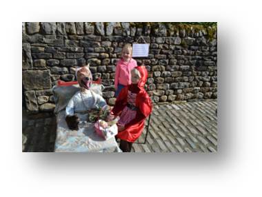 The big bad wolf, little red riding hood and little miss-chief at the Wray Scarecrow festival.
