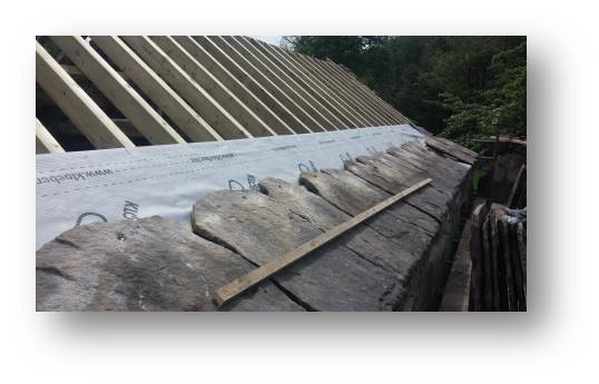 The upper course of stone slate