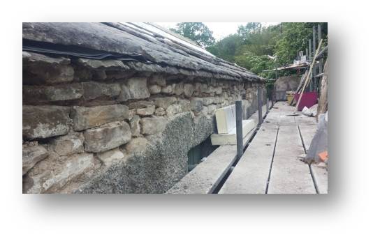 On removing the top part of the rice-pudding render it was clear the stone beneath was in good enough condition to bring out again.