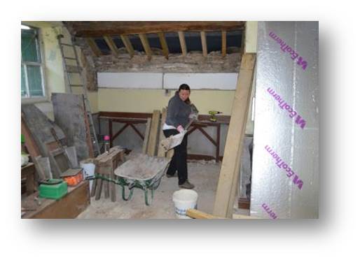 Rachel getting stuck into some grimy cleaning up work at Temperance Hall
