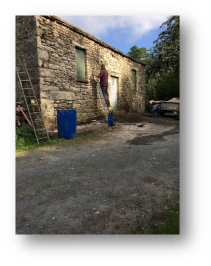 After Gary has had enough, it's my turn to rake out the old mortar between the stones