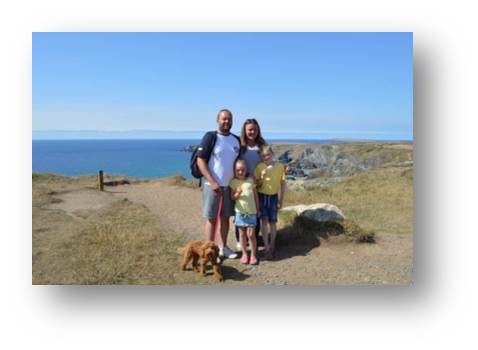 The family enjoying a coastal walk around the clifftops