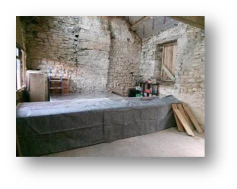 Mocking up the floor level with scaffolding and roofing felt