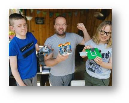 A photo of me and the kids, trying to look magnanimous in victory..because I won...just so you know